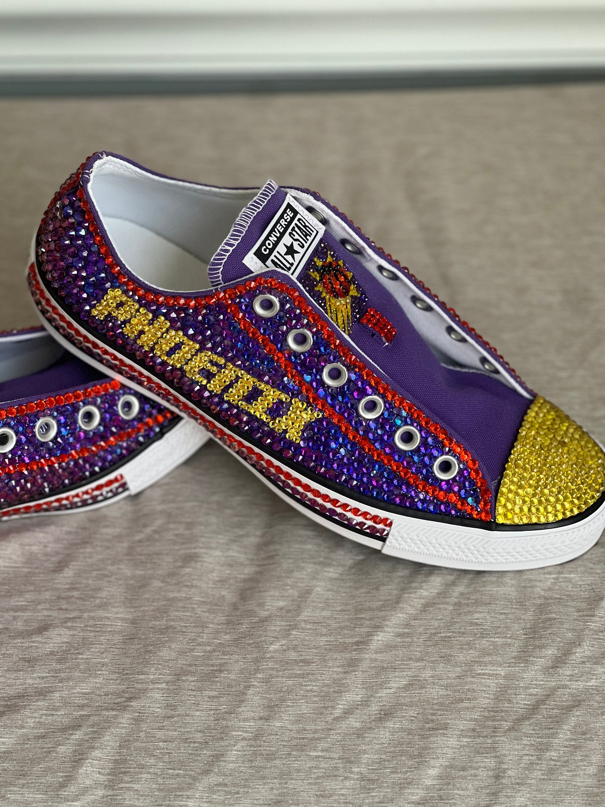 NBA/NHL Rhinestoned Low Top Converse Tennis shoes.